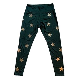 Jessica Simpson “The Warmup” leggings. Green with gold stars. Size M.
